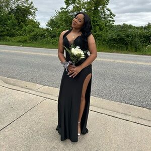 Black prom/sweet 16 dress from ABC fashion. Also has silver jems attached.